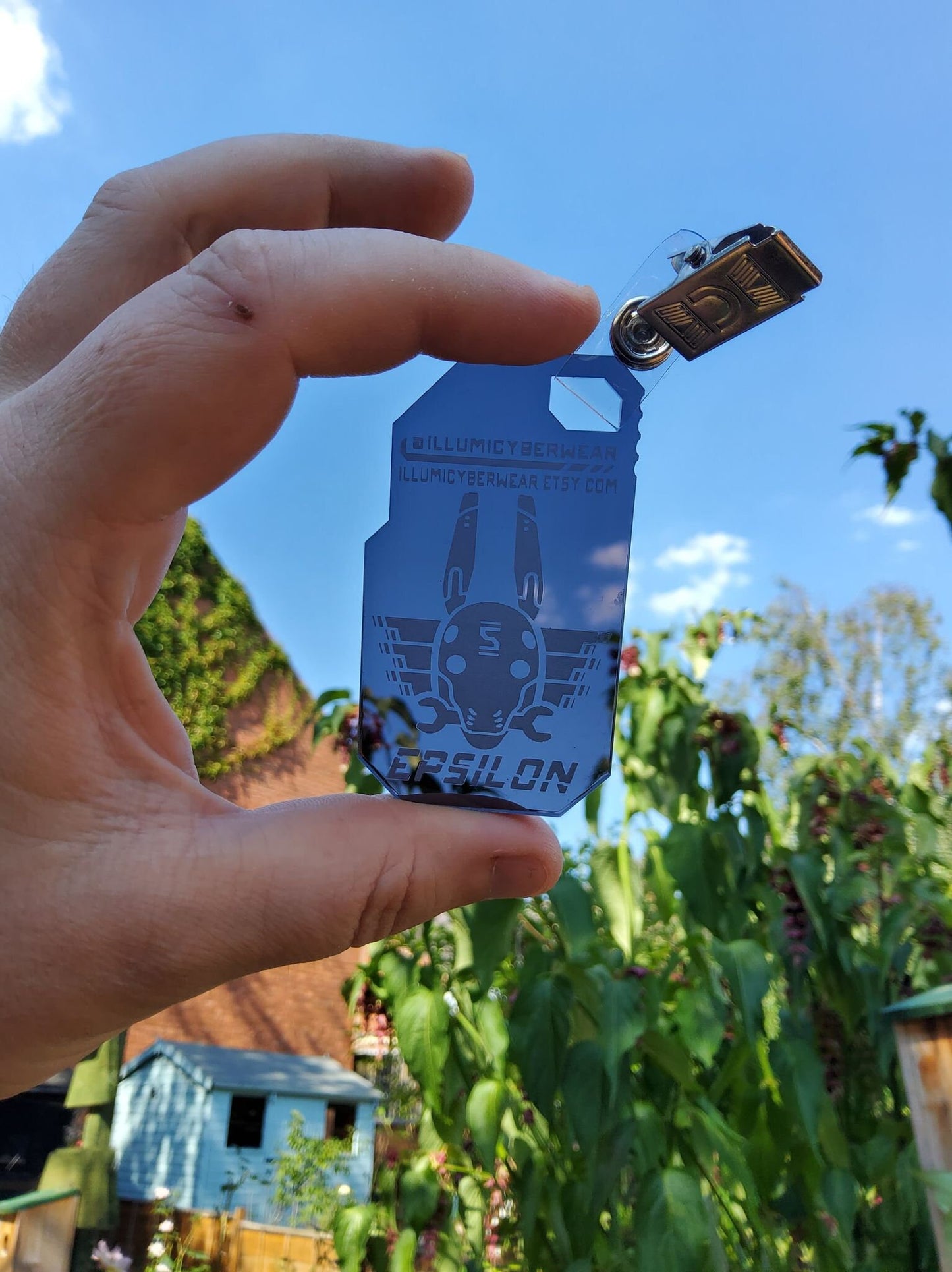 Epsilon clip-on badge